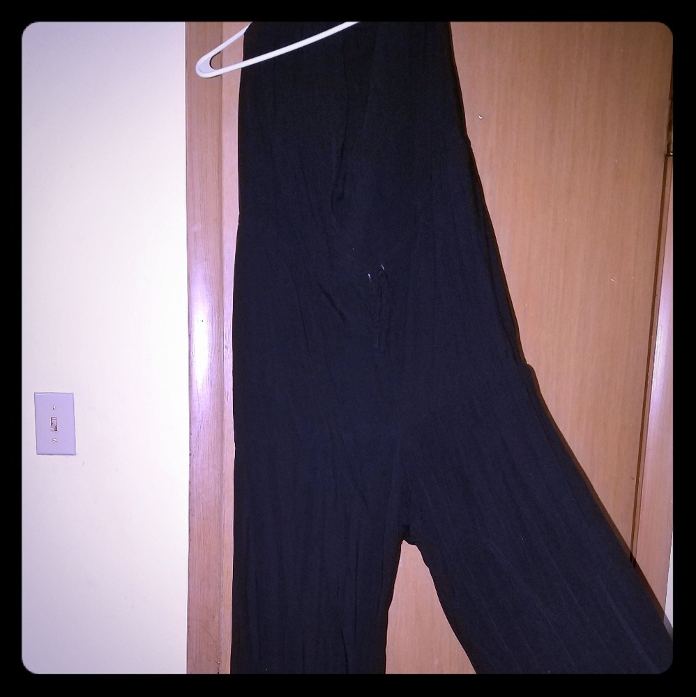 Jump sleeveless suit. Light material. Size 18.